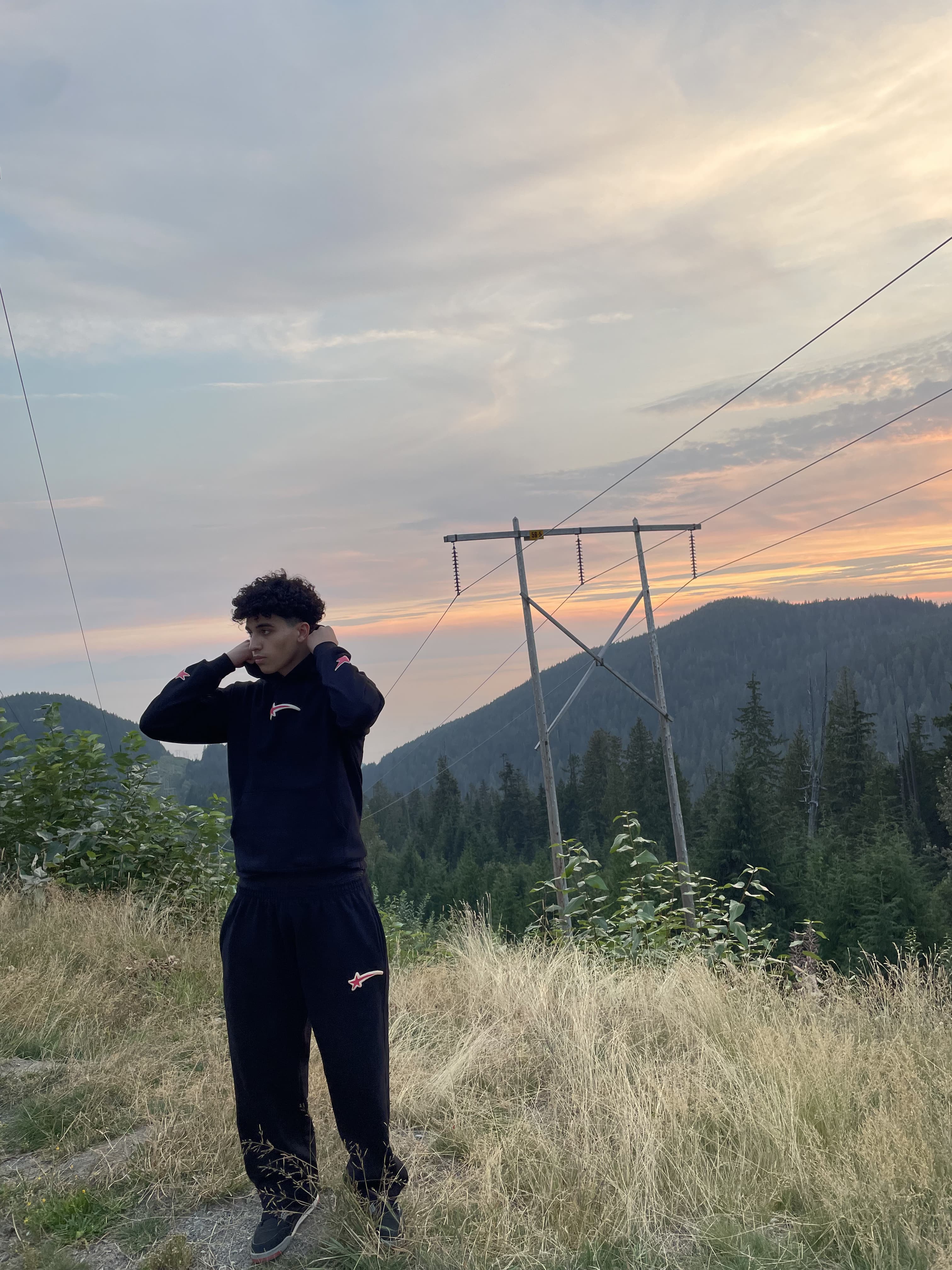 Global Attire sweatsuit in the mountains